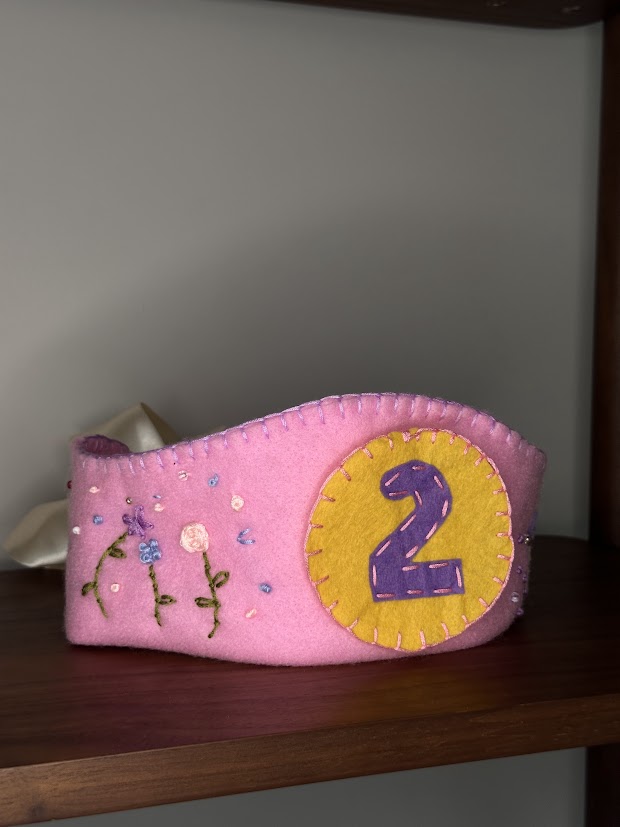 Pink felt diadem crown with floral embroidery and a purple number 2